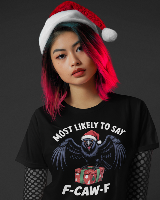 Person wearing a black t-shirt with a graphic design says Most Likely To Say F-Caw-F, and a Santa hat.