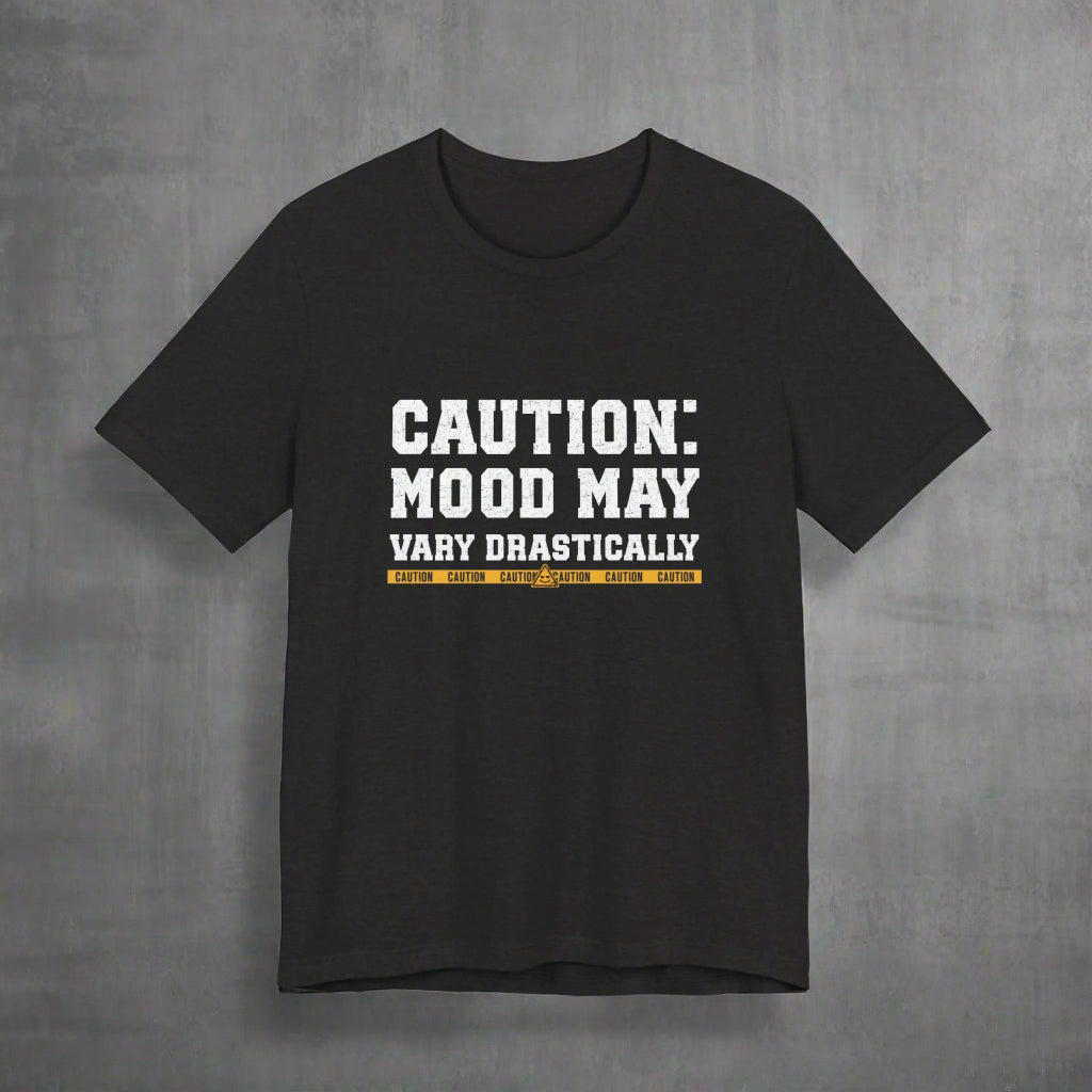 Black t-shirt with humorous text design, Caution Mood May Vary Drastically. Funny T-Shirt