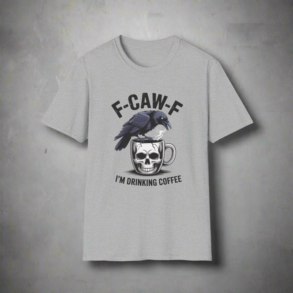 Gray t-shirt with a graphic of a crow on a skull with a coffee cup and text 'F-CAW-F I'M DRINKING COFFEE' on a white background.